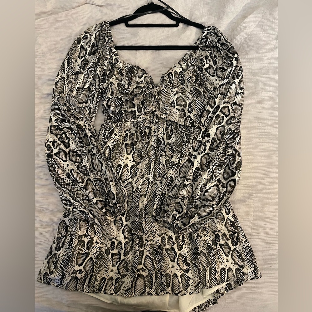 Long sleeve Black and White Snake Print dress with cutout tie back